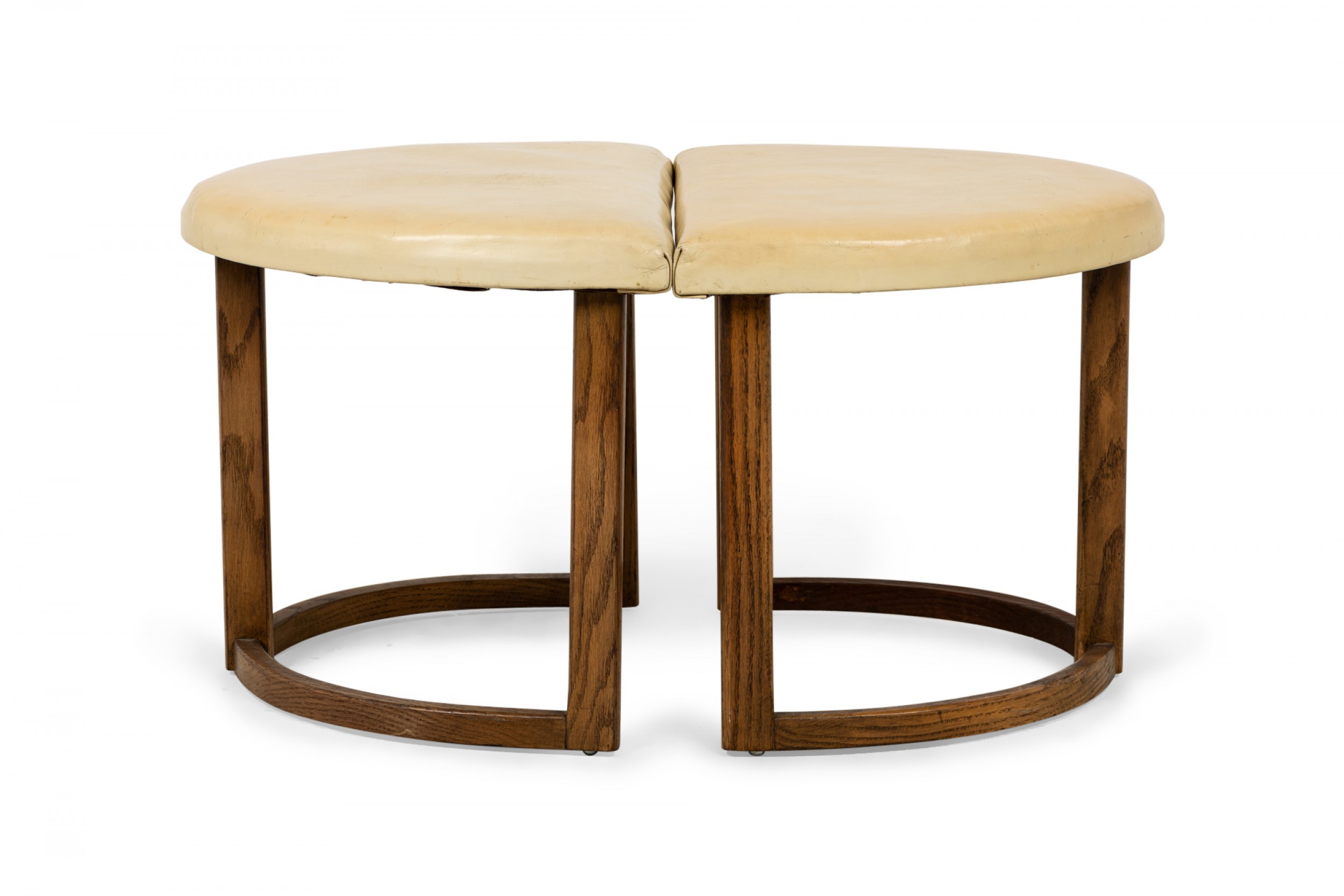 Pair of american mid century half moon beige leather and walnut footstools