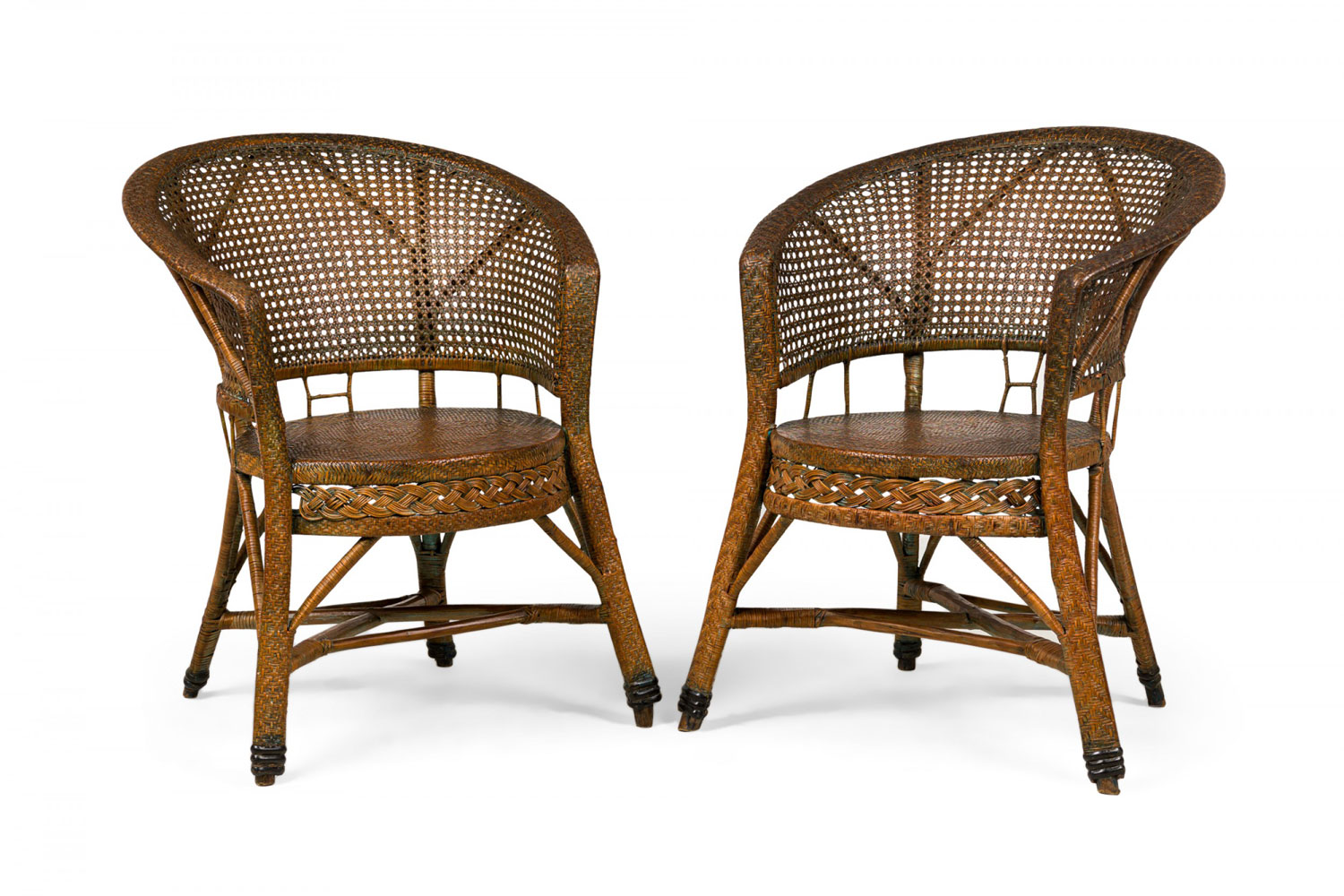 Pair of mid century american wicker cane pull up armchairs