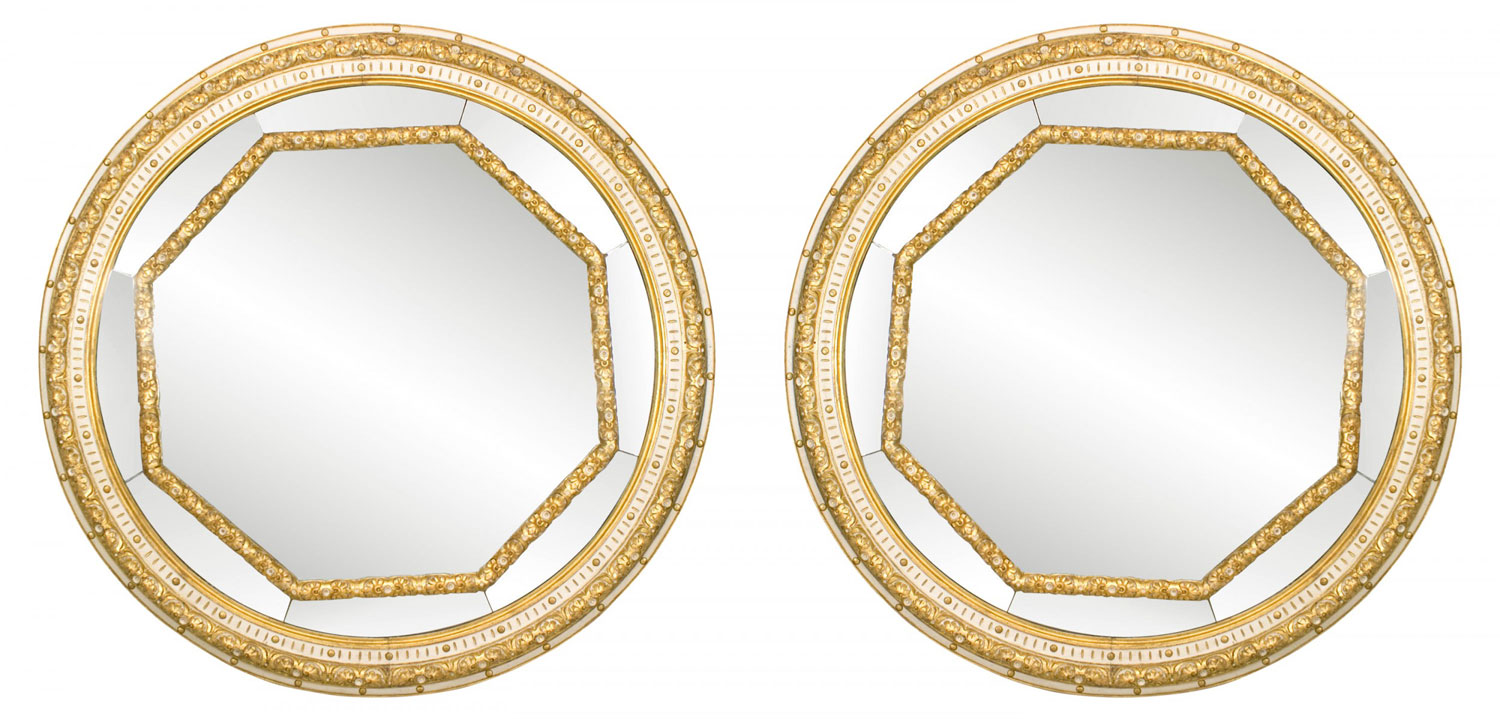 Italian neoclassic white painted and gilt round wall mirrors