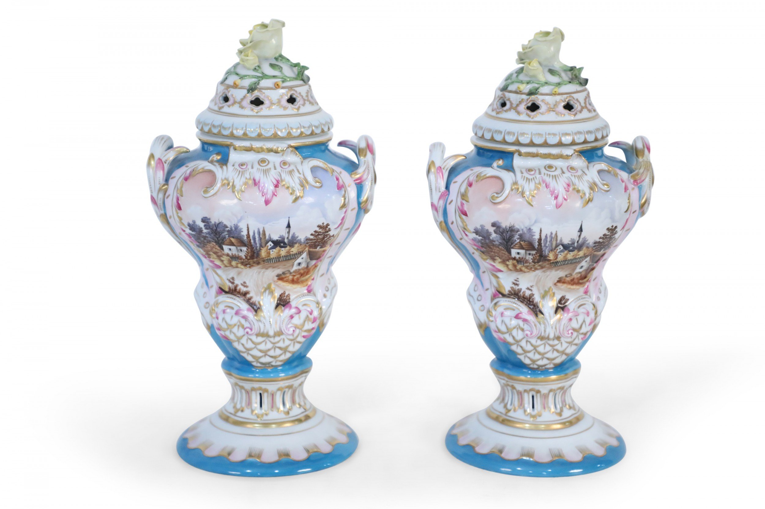 Pair of Eastern European Decorated and Lidded Porcelain Urns