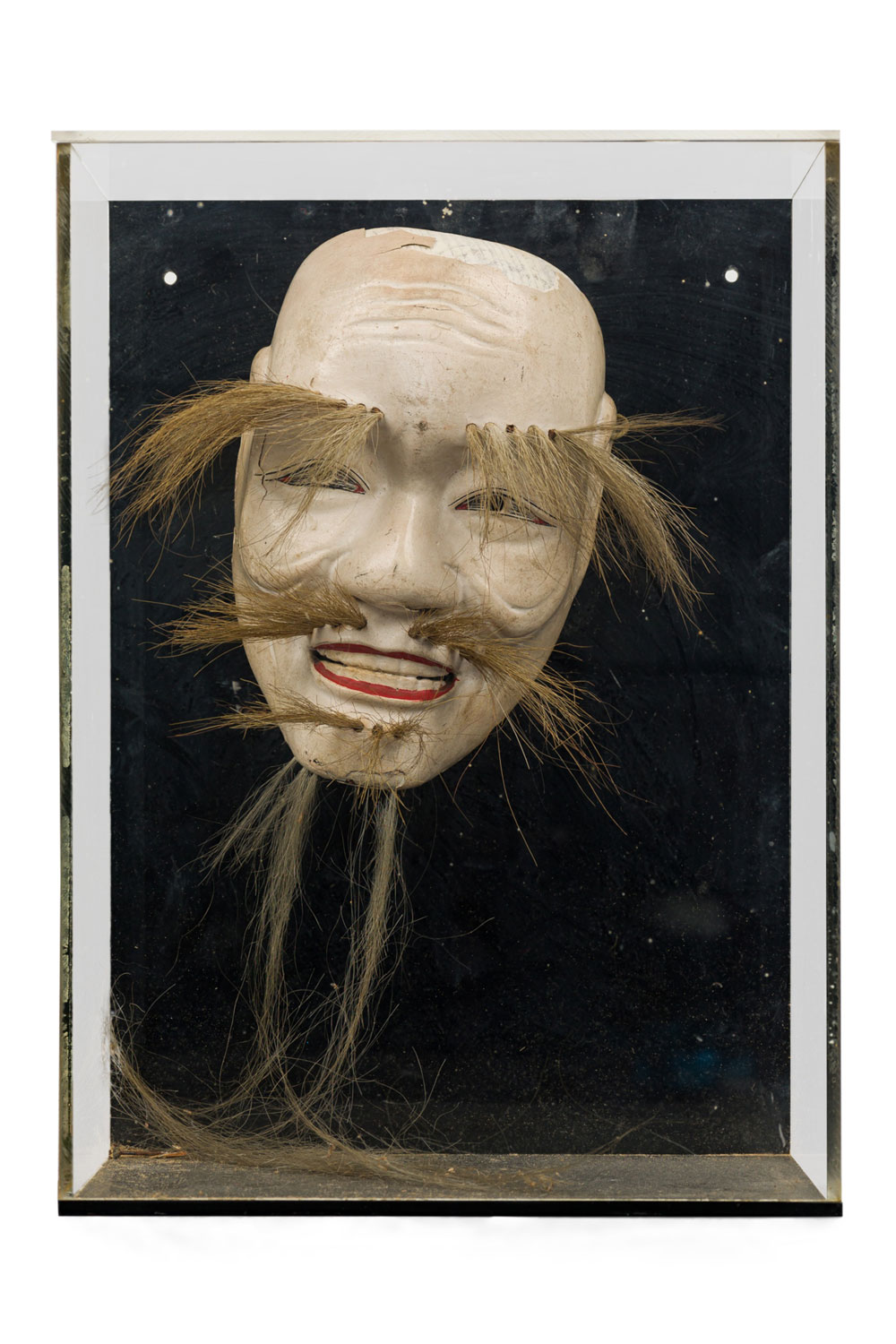 Japanese ceramic onikami noh mask in a shadow box