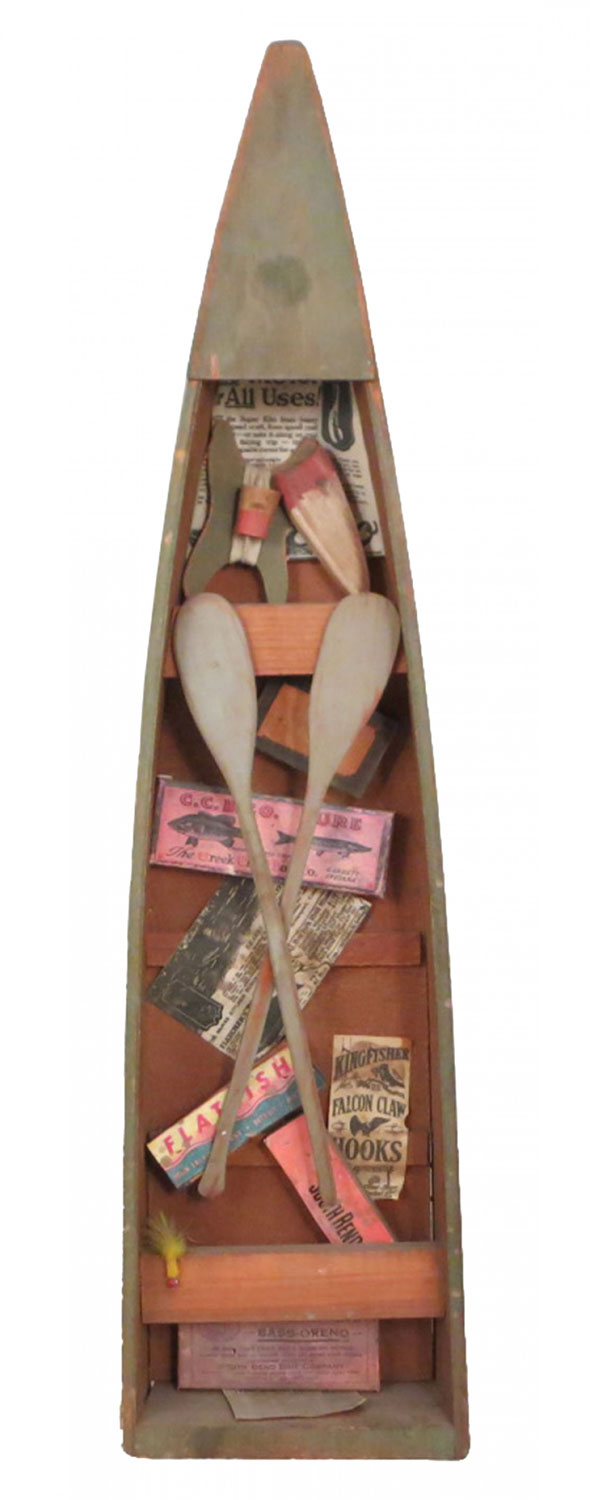 Rustic model rowboat with fishing tackle