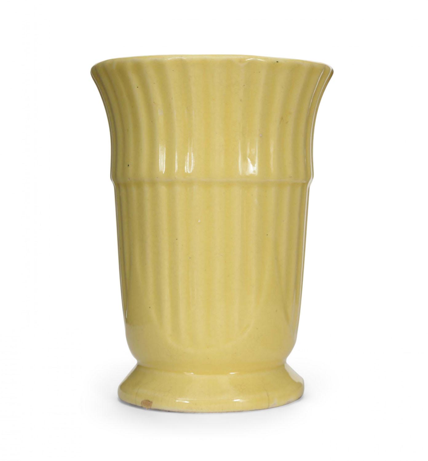 Art deco style yellow ceramic urn