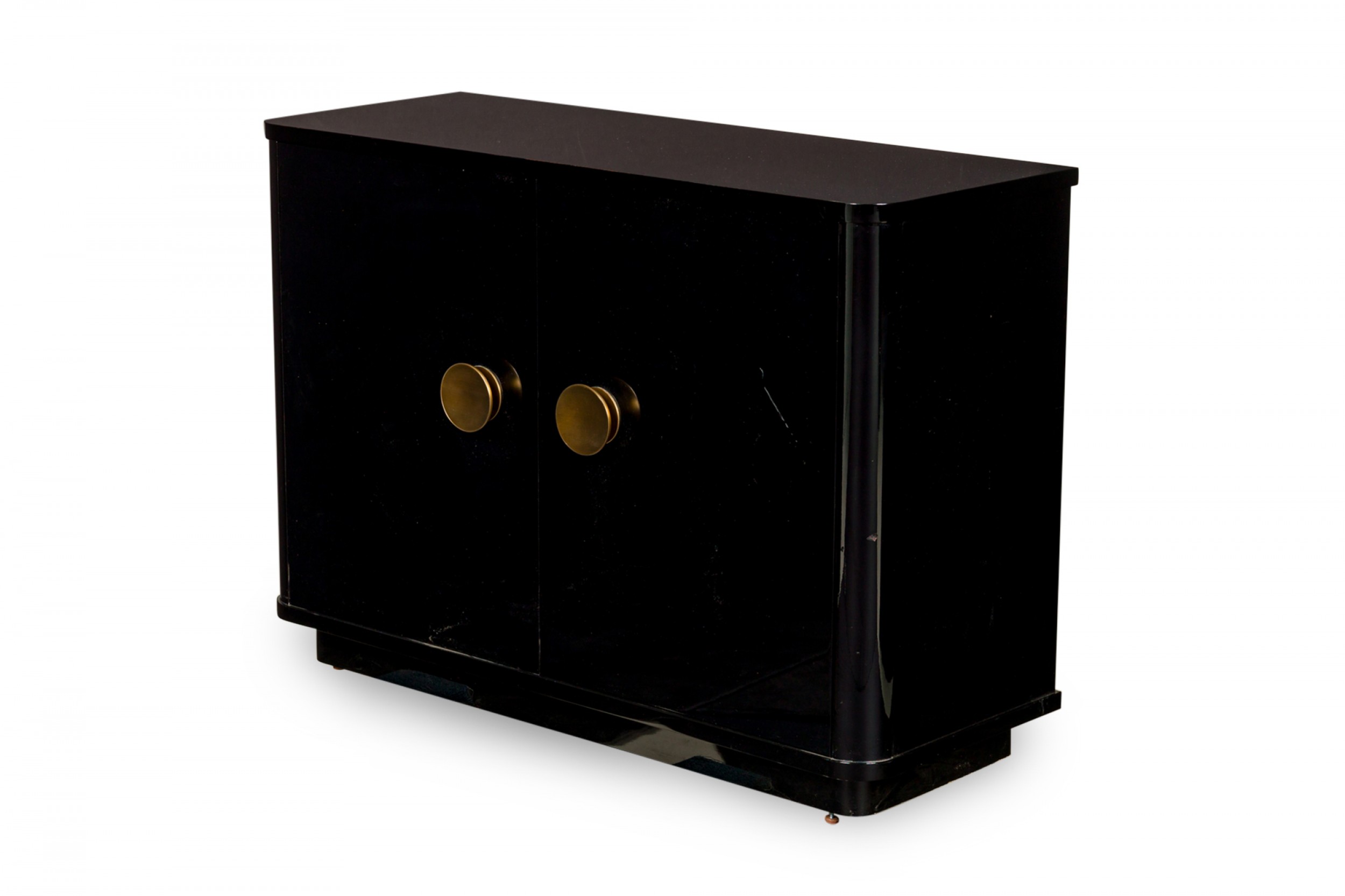 Pair of contemporary black lacquered low breakfront cabinets with large circular gilt metal door pulls