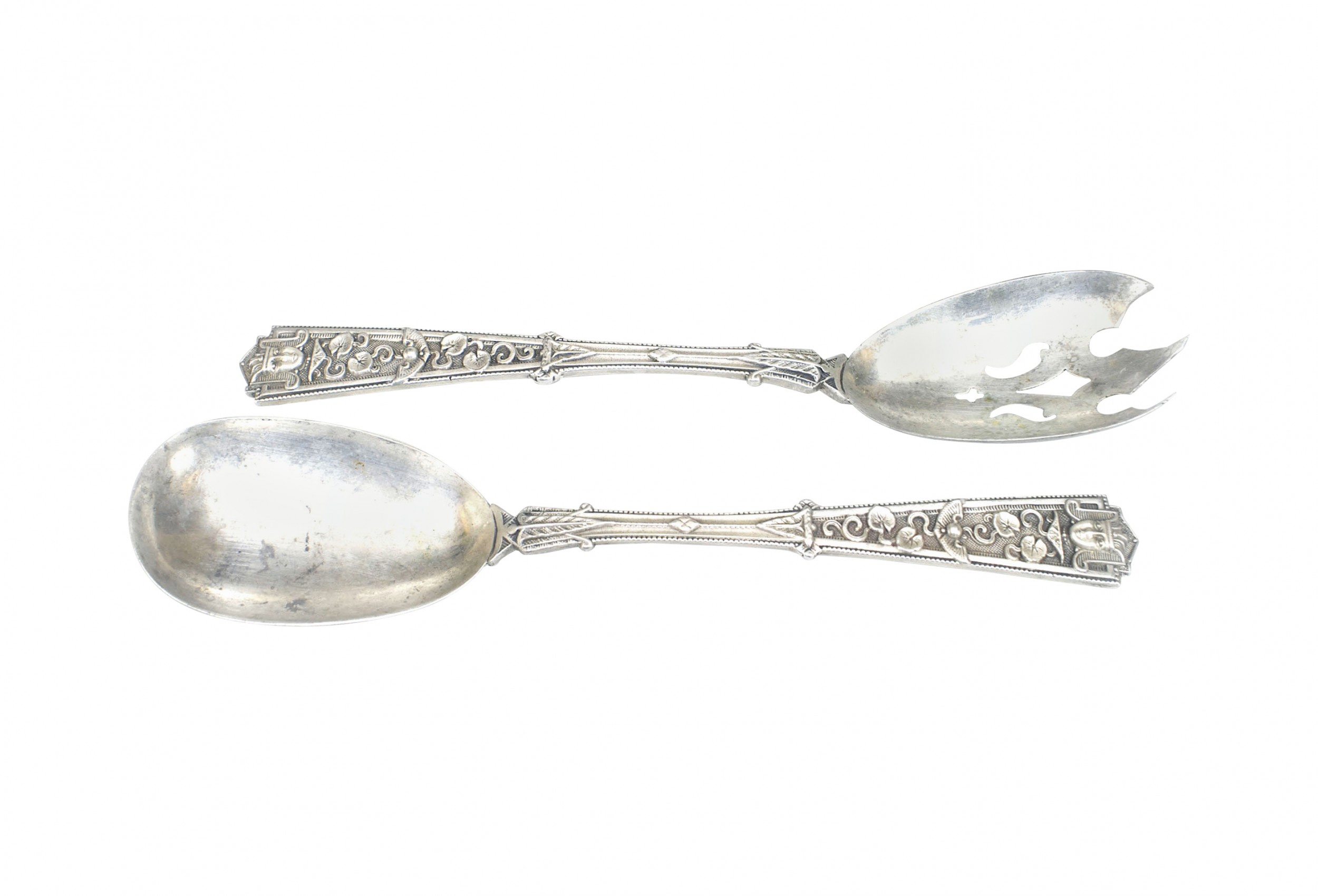 Pair of english arts crafts egyptian revival silver spoons