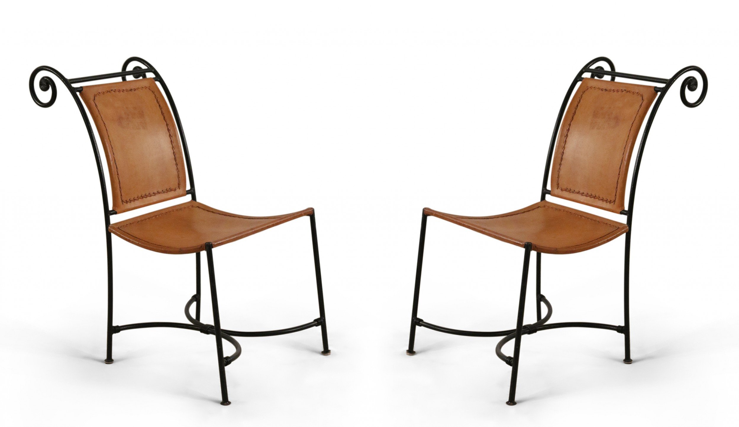 Pair of mid century wrought iron and leather side chairs