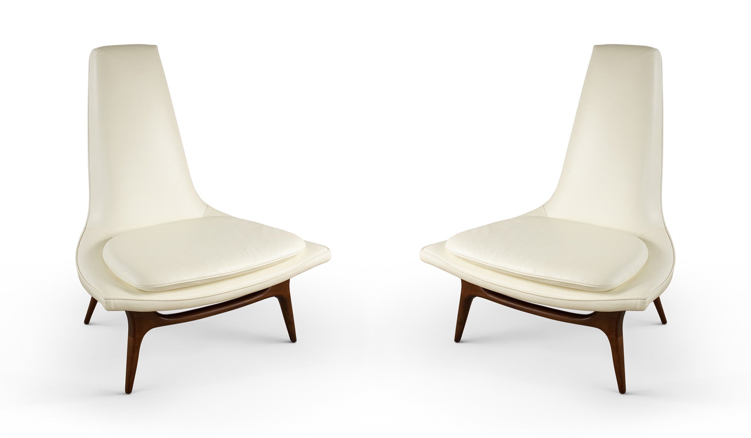 Pair of mid century karpen walnut lounge chairs with white vinyl