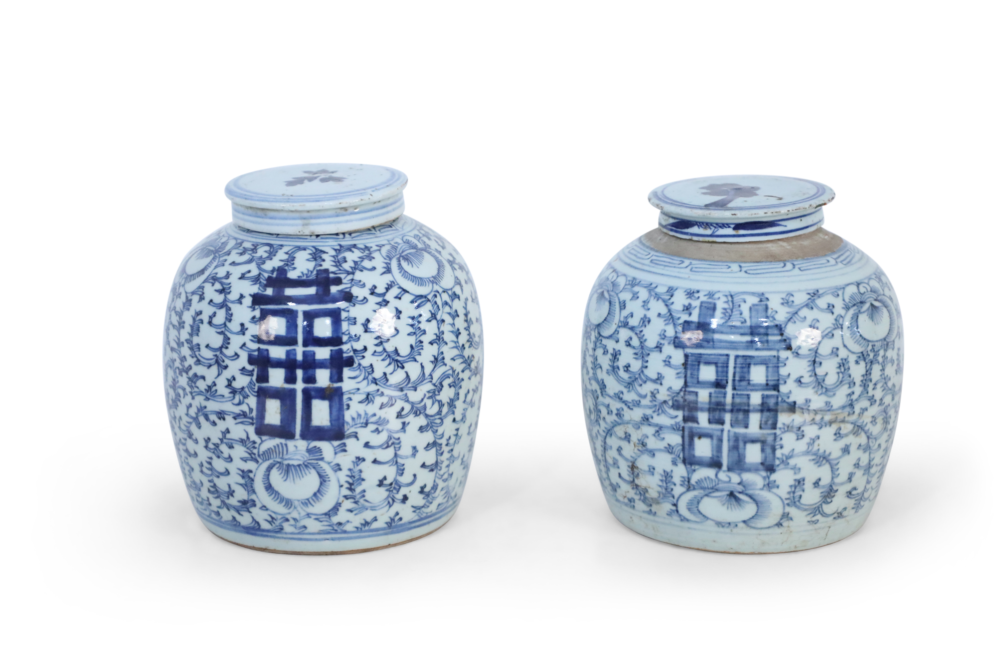 Pair of chinese blue and white floral lidded ginger jar vases
