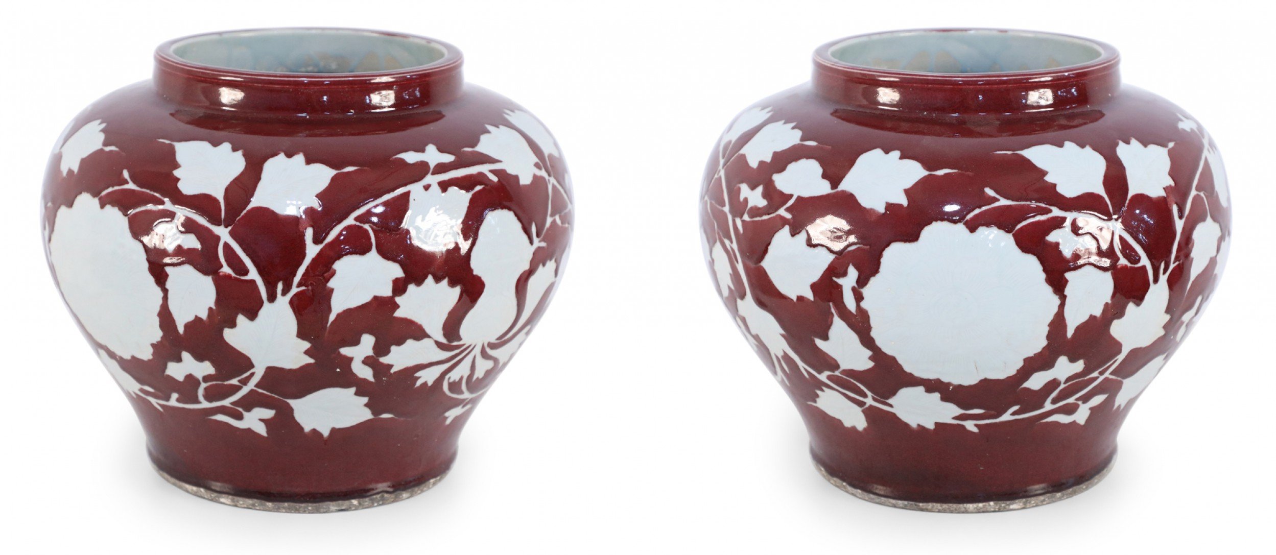 Pair of Chinese Burgundy and White Floral Motif Pots 