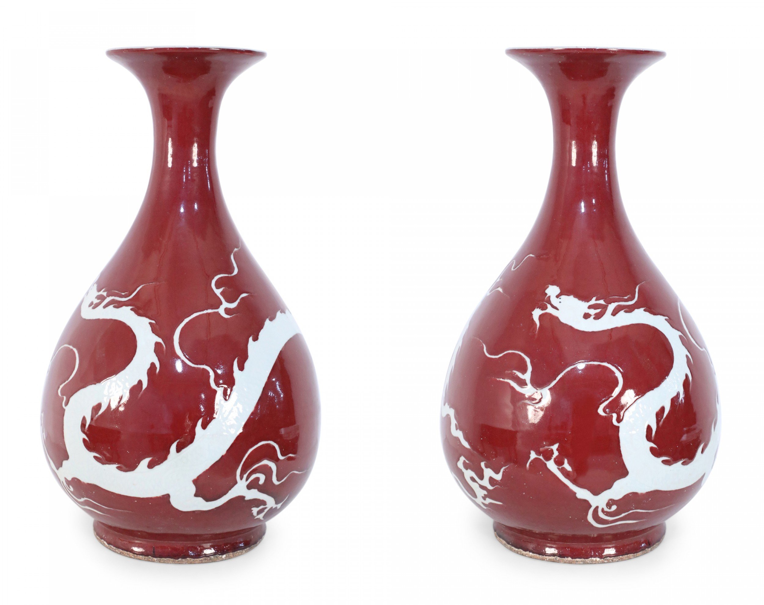 Pair of Chinese Burgundy and White Dragon Motif Vases