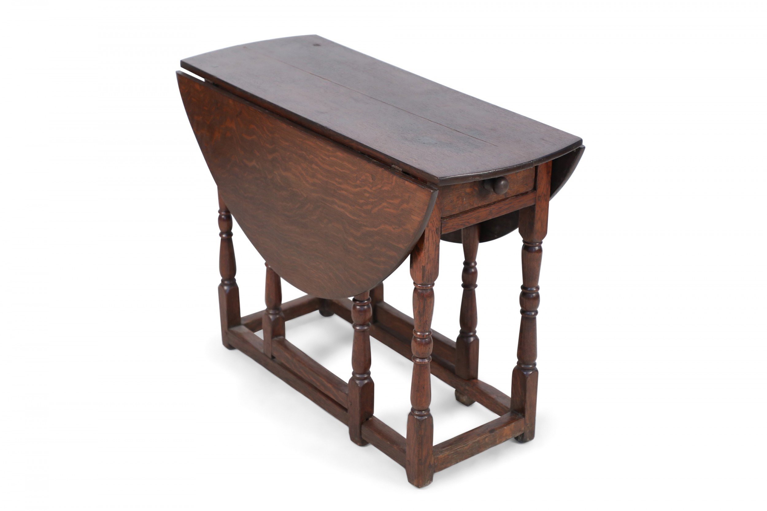English renaissance style walnut drop leaf center table