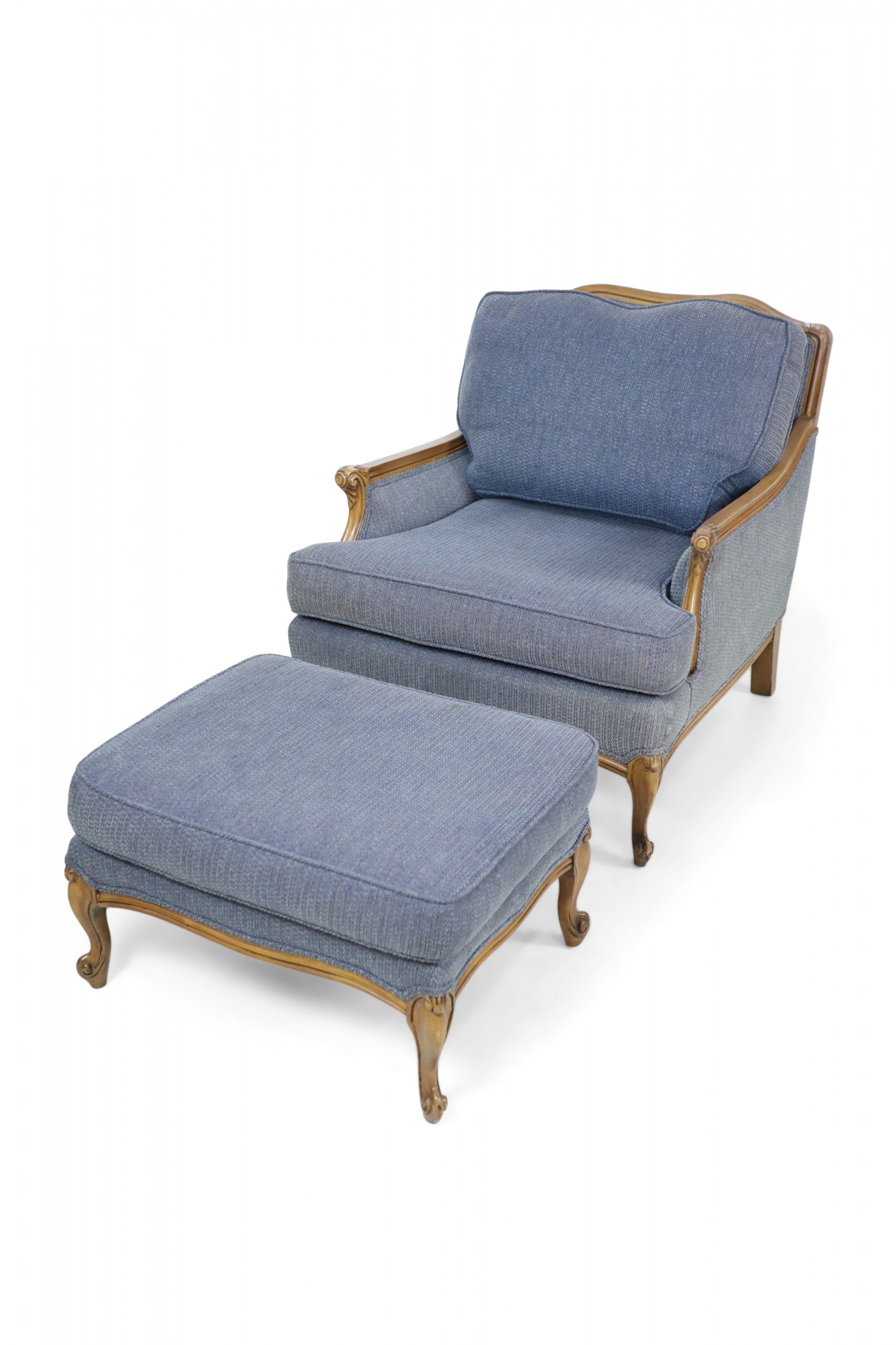Louis xv style bergere in navy upholstery and matching ottoman