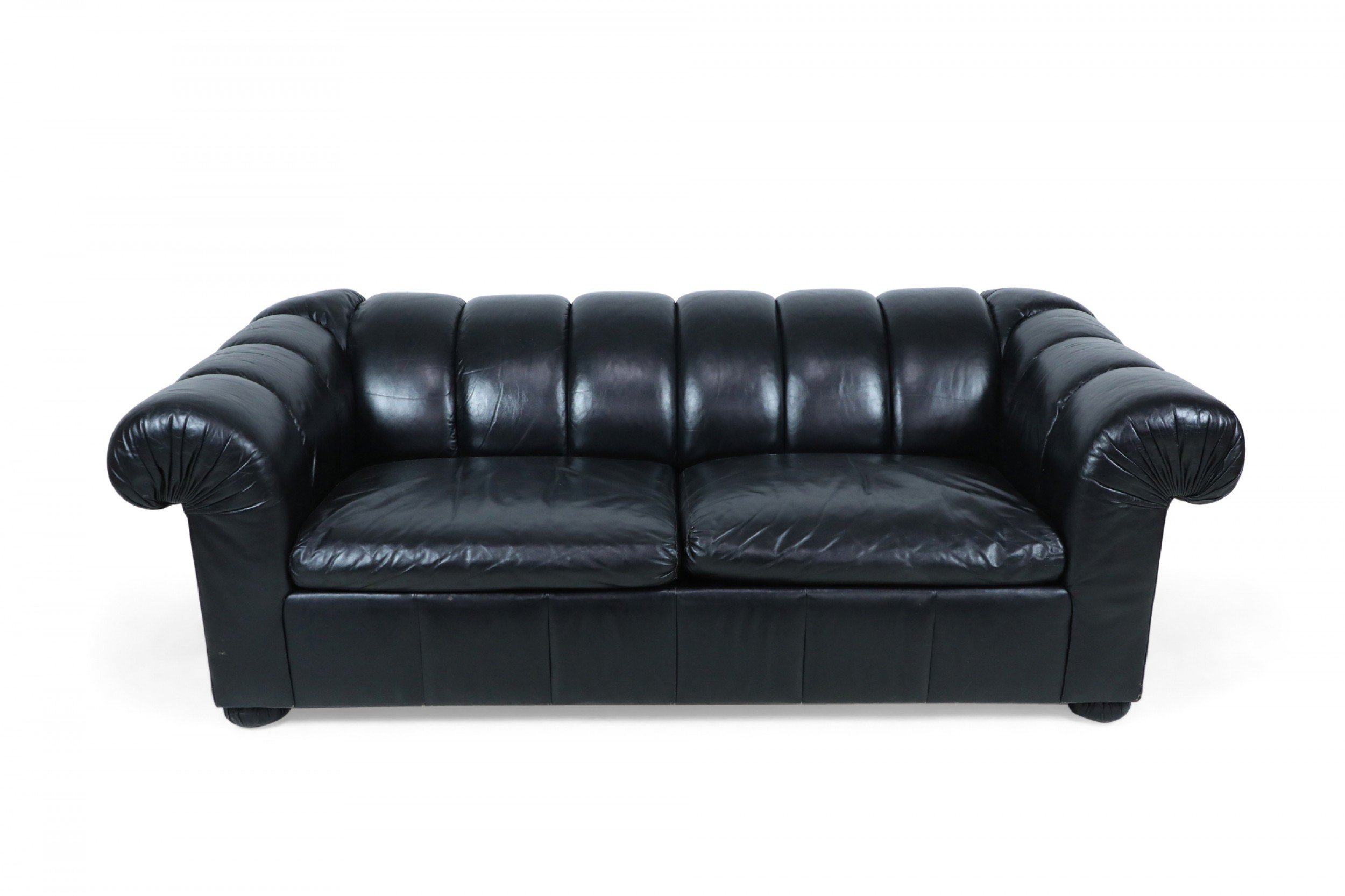 Modern black leather channeled sofa bed