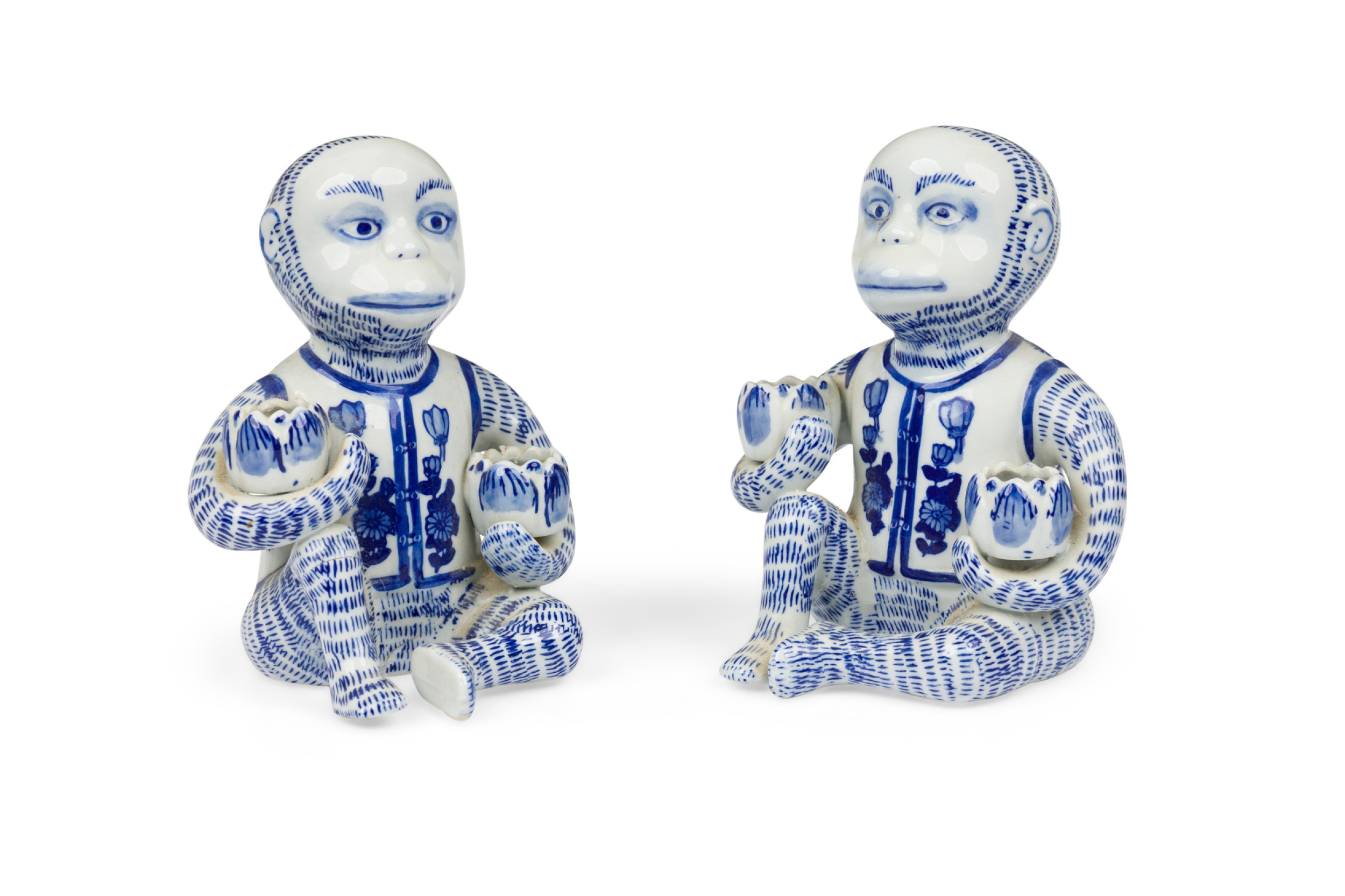 Pair of vintage chinese style blue and white monkey candlestick holder