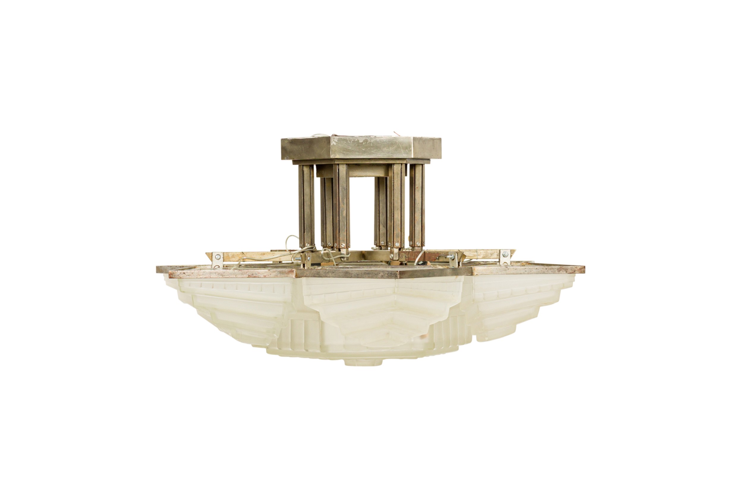 French art deco chandelier with 6 shades and a large centered 6 sided geometric frosted shade