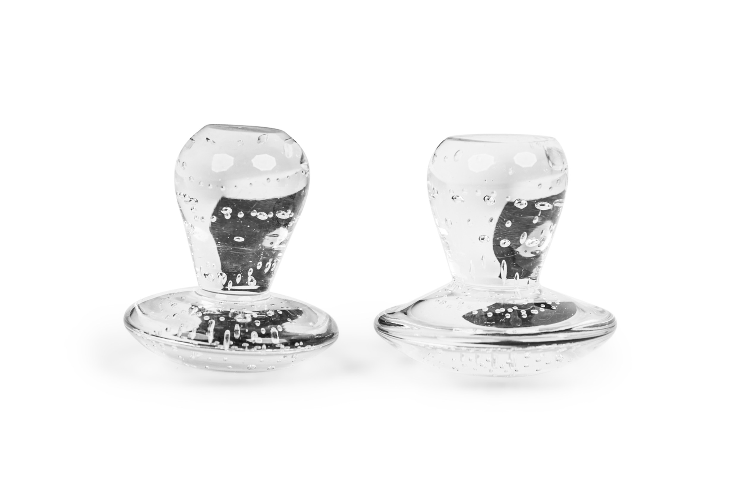 2 american mid century similar sized crystal spinning top paper weight 