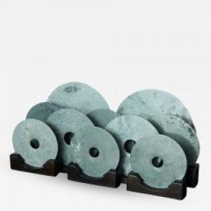 Chinese stone bi discs on wooden stands