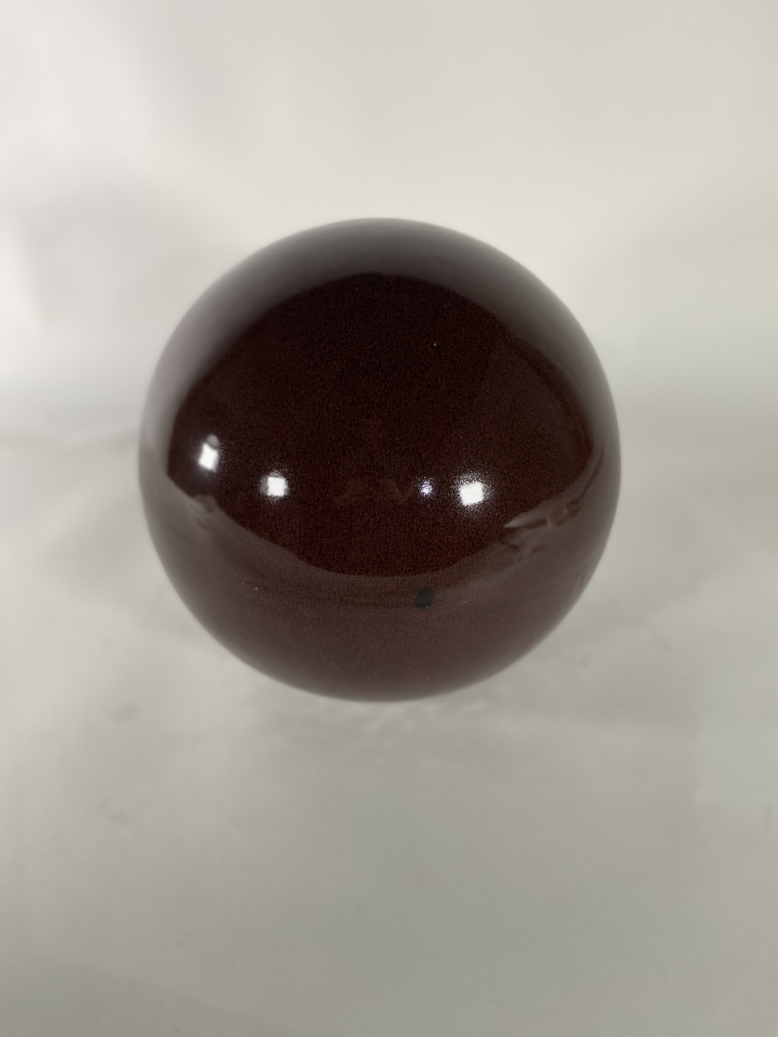 Large burgandy ceramic spheres