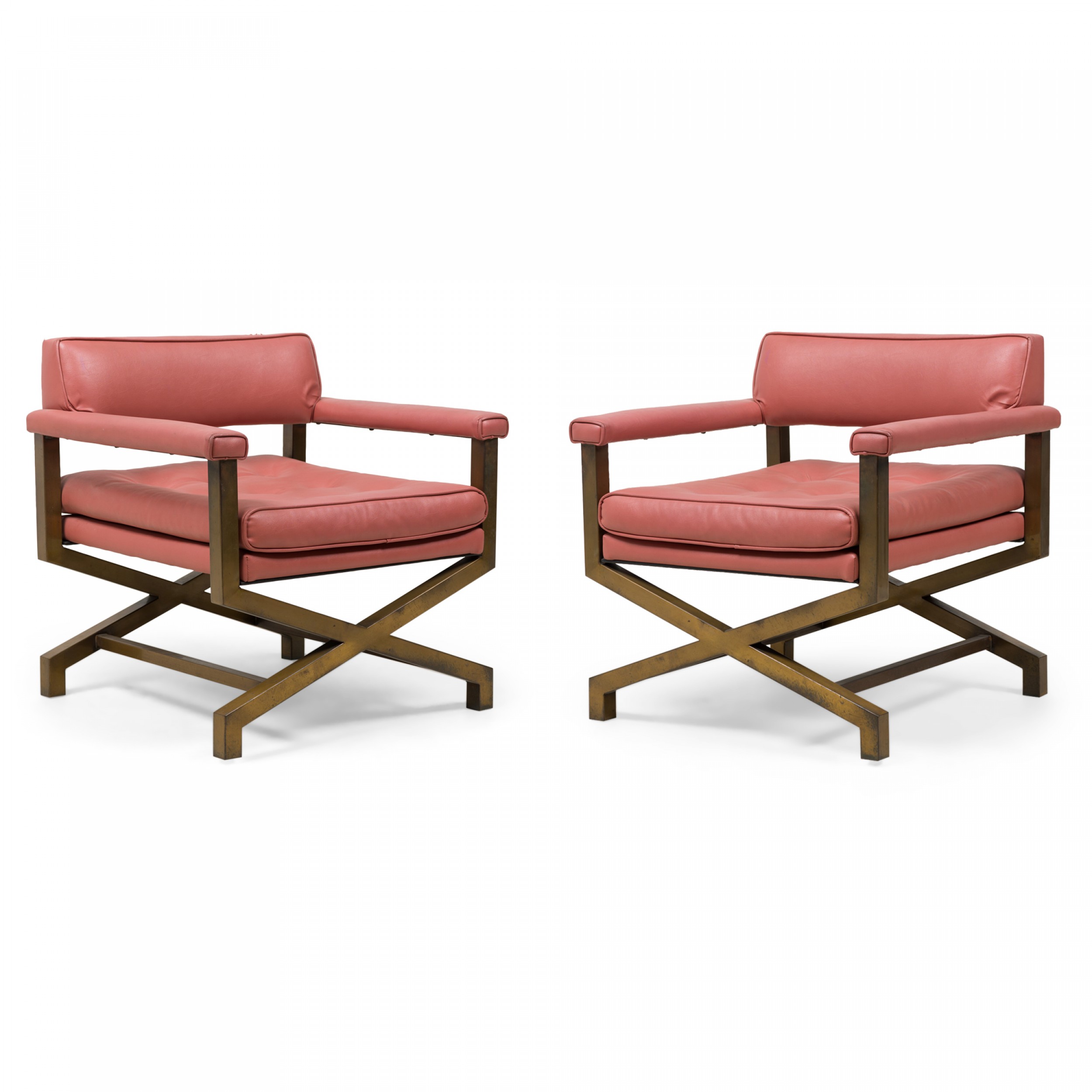 Pair of mid century american upholstered campaign armchairs attributed to tommi parzinger 