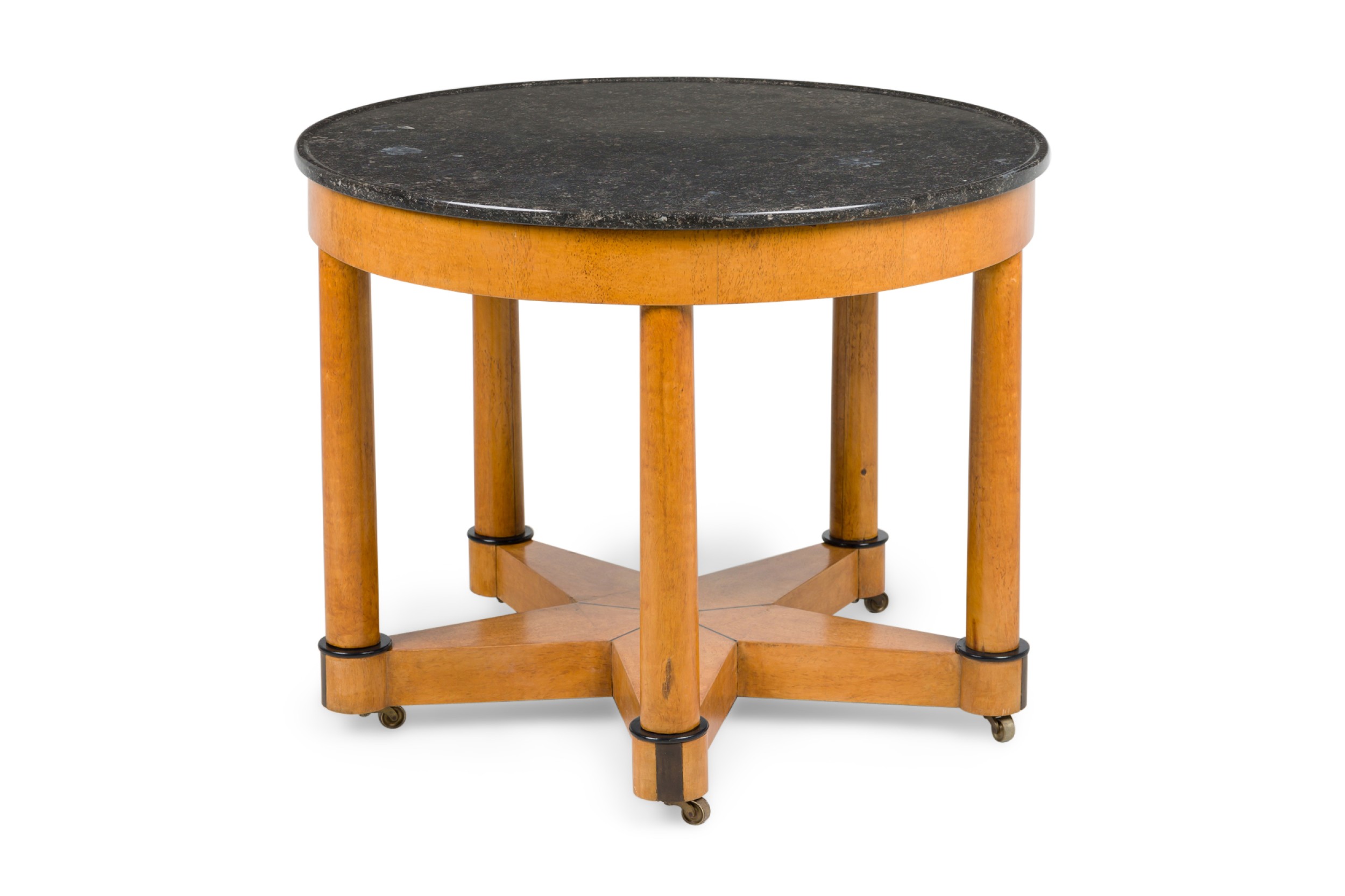 Continental mid century round center table with 5 legs resting on 5 legs and speckled black marble top