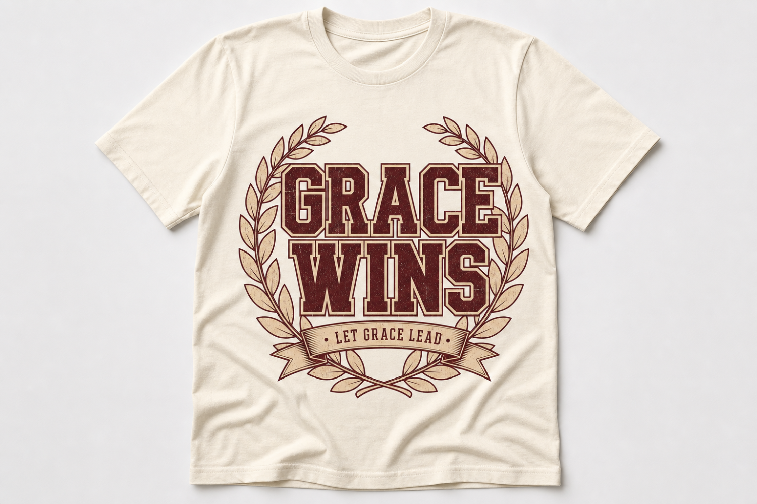 Grace Wins | Cream_Grace_Wins_Christian_varsity_graphic_t-shirt_laid_flat.png