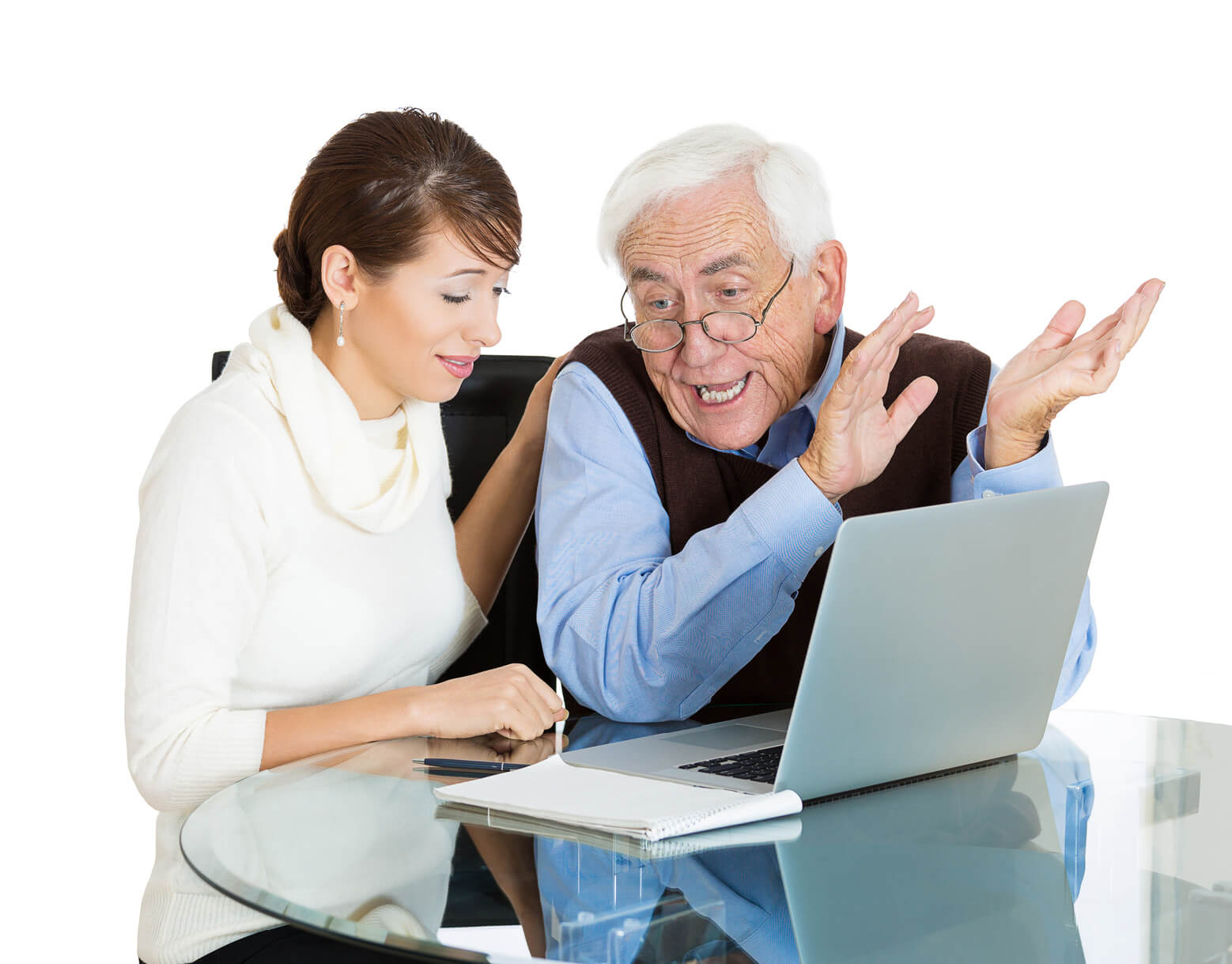 Mature man being show how to use laptop