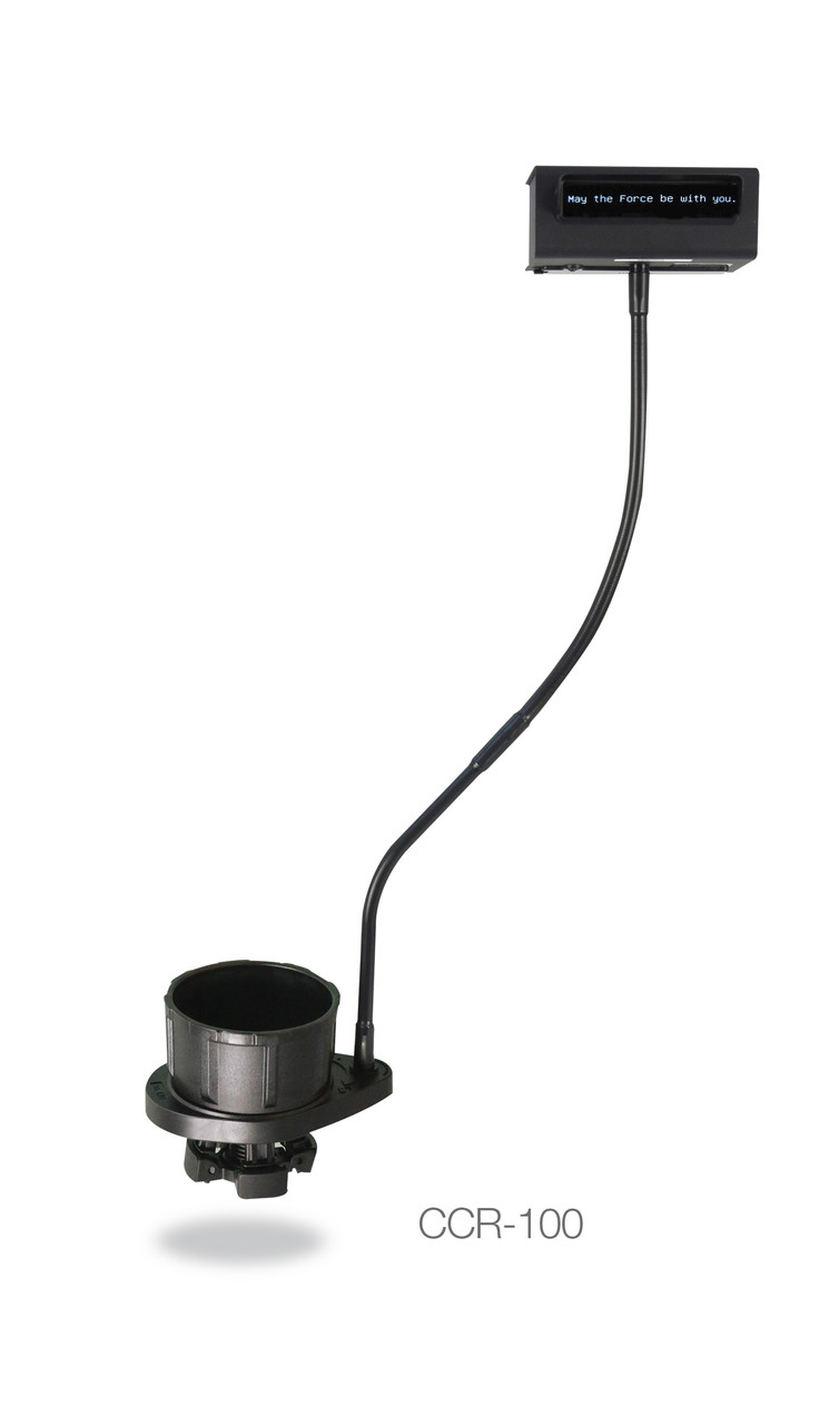 Image of a Closed-Caption Reader. A black metal box has a screen on it. Glowing green text reads, "May the force be with you." The box sits atop a flexible metal arm connecting to a cupholder insert.