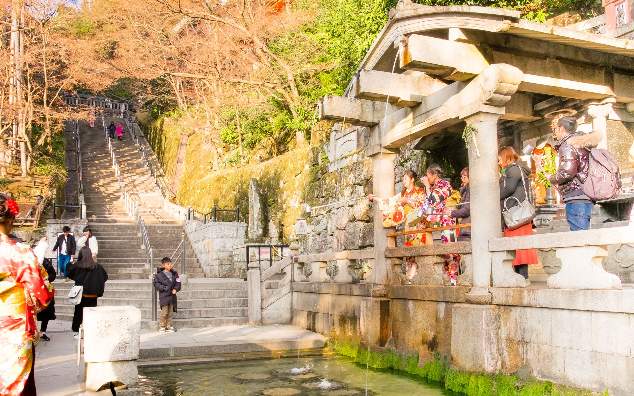 Drinking from the Otowa Waterfall