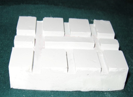 Photograph showing the master die for fine detail reproduction