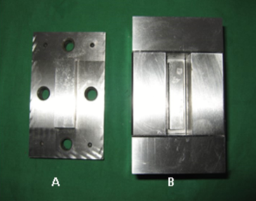 Photograph of the assembled mold, ready for use. A — Top slab, B — Assembled mold