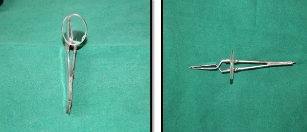 Bracket holder with magnifying lens.