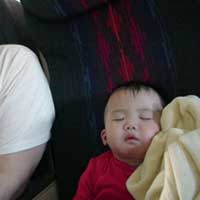 See if you can guess who was the bigger baby on the flight home.