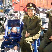 Matthew with some official looking ladies.