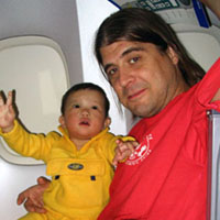 Three children on a looooooooong flight.