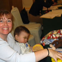 A thrilled Mommy with her latest catch.