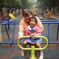 Olivia and her mommy go stationary biking.