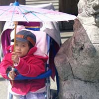 Olivia poses lake side.