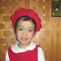 The young lady in red.