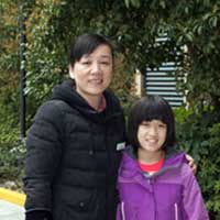 Olivia and the director of her orphanage.