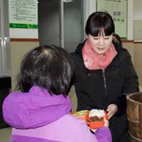 Having lunch in the orphanage.