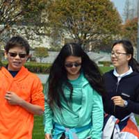 Museum goers walking.