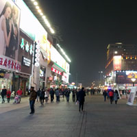 Walking the nighttime streets of Beijing.