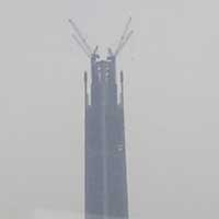 Random skyscraper under construction in The-middle-of-nowhere, China.