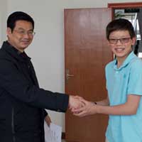 The Orphanage Director both now and then.