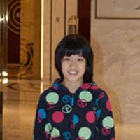 Olivia in the lobby of the hotel we stayed in when we adopted her in 2006.