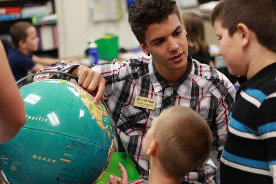up with people student volunteering abroad