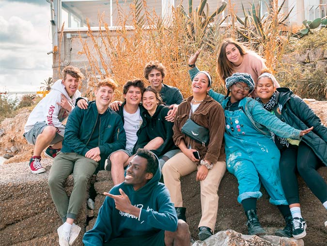 up with people international cast standing together