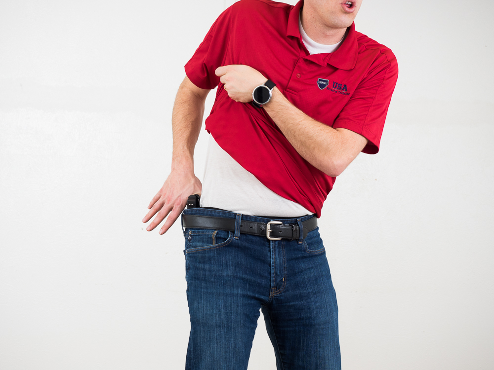 Driving the Thumb Between the Holster and Body