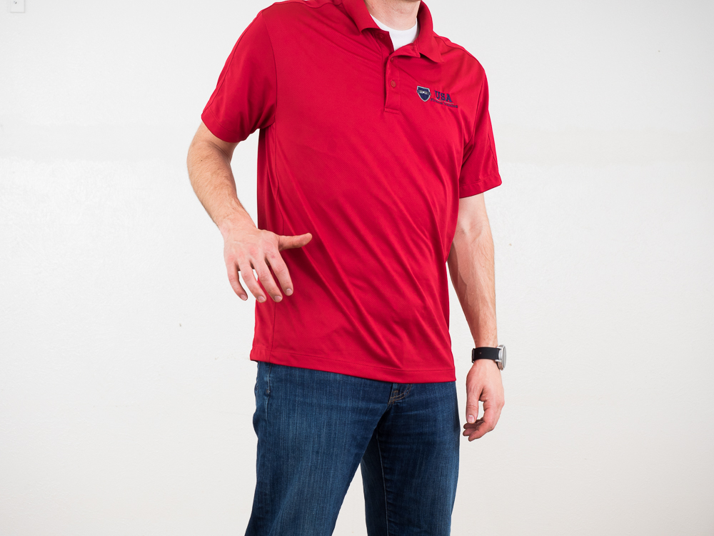 Strong hand sweeps away outer garments