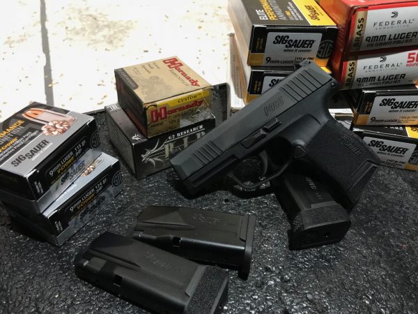 SIG-P365-With-Boxes-of-Test-Ammo